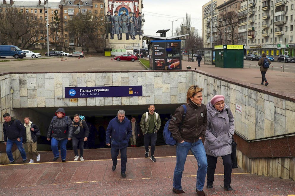 epa09860739 Citizens leave a metro station in the city center in Kyiv, Ukraine, 30 March 2022. Russian troops entered Ukraine on 24 February resulting in fighting and destruction in the country, and triggering a series of severe economic sanctions on Russia by Western countries. EPA/NUNO VEIGA
