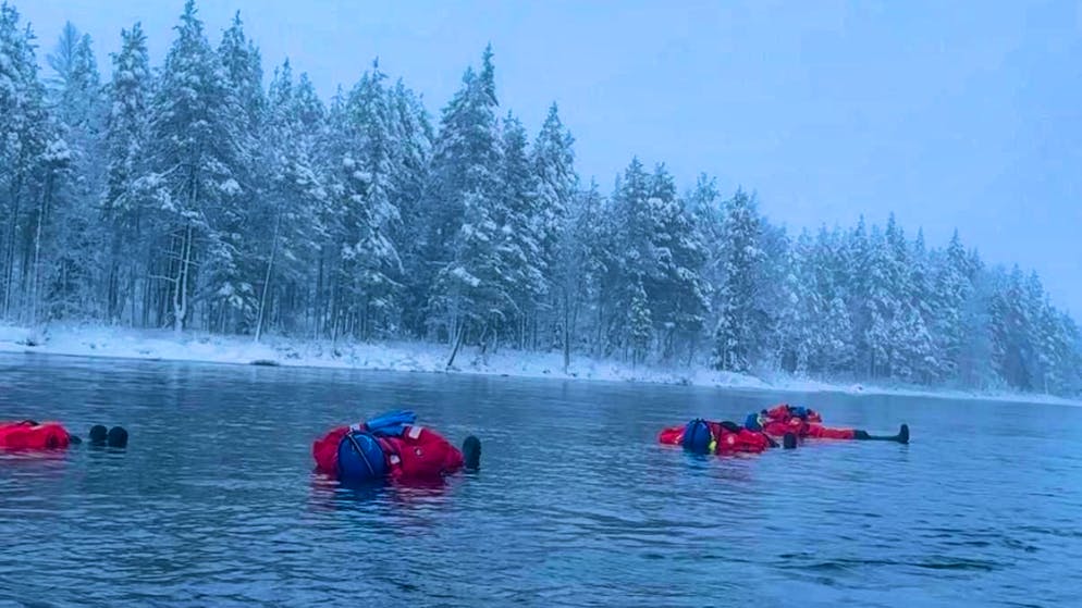 Wrapped up in thick layers, you float downstream.