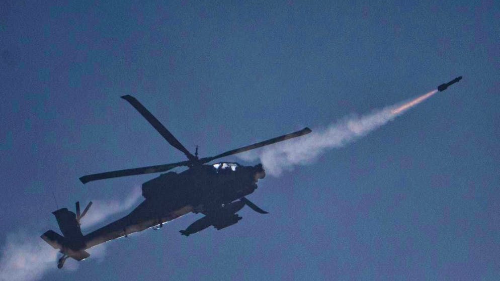 ARCHIVE - An Israeli Apache helicopter fires a missile at southern Lebanon. Photo: Leo Correa/AP/dpa