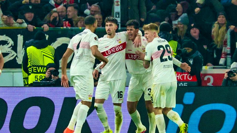 The Stuttgart players celebrate the late winning goal