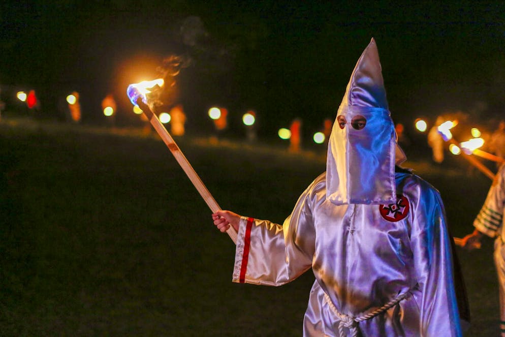 Several men apparently turned up in Ku Klux Klan costumes.