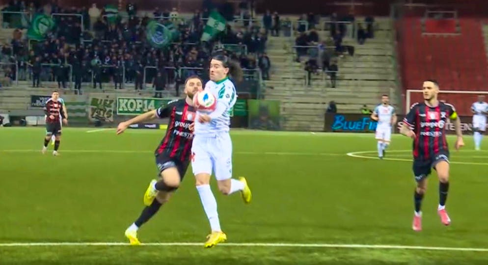 The goalscorer is lucky not to be whistled back.