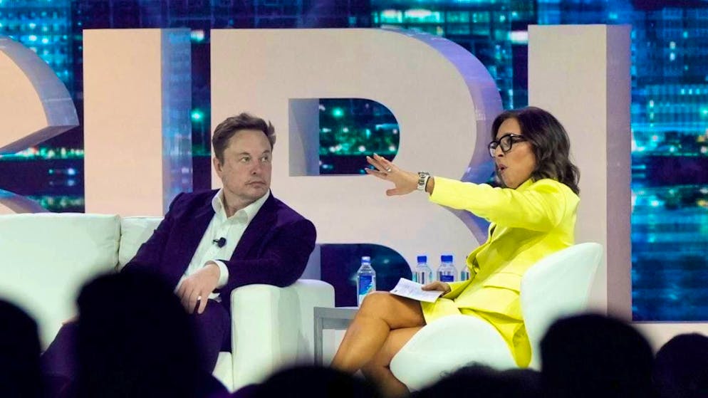 Tech billionaire Elon Musk and X CEO Linda Yaccarino - pictured at a joint event in Florida - are under pressure from the French judiciary because of the AI chatbot Grok. (archive picture)