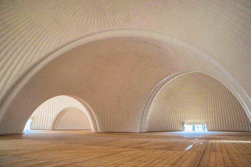 Six interconnected, inflatable domes form the roof over the Phänomena.