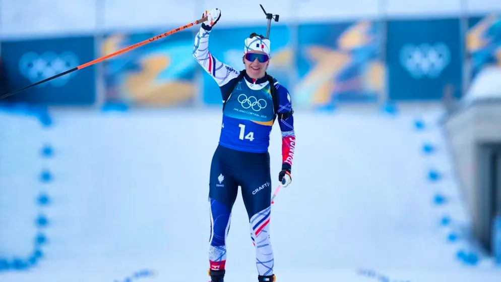 Final skier Julia Simon celebrates victory for France