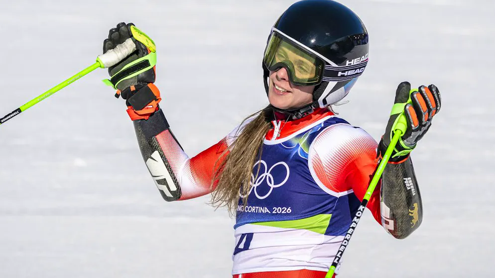 Camille Rast of Switzerland reacts in the finish area during the women's alpine skiing second run of the giant slalom race at the 2026 Olympic Winter Games at the Tofane Alpine Skiing centre in Cortina d'Ampezzo, Italy, on Sunday, February 15, 2026. (KEYSTONE/Jean-Christophe Bott)..