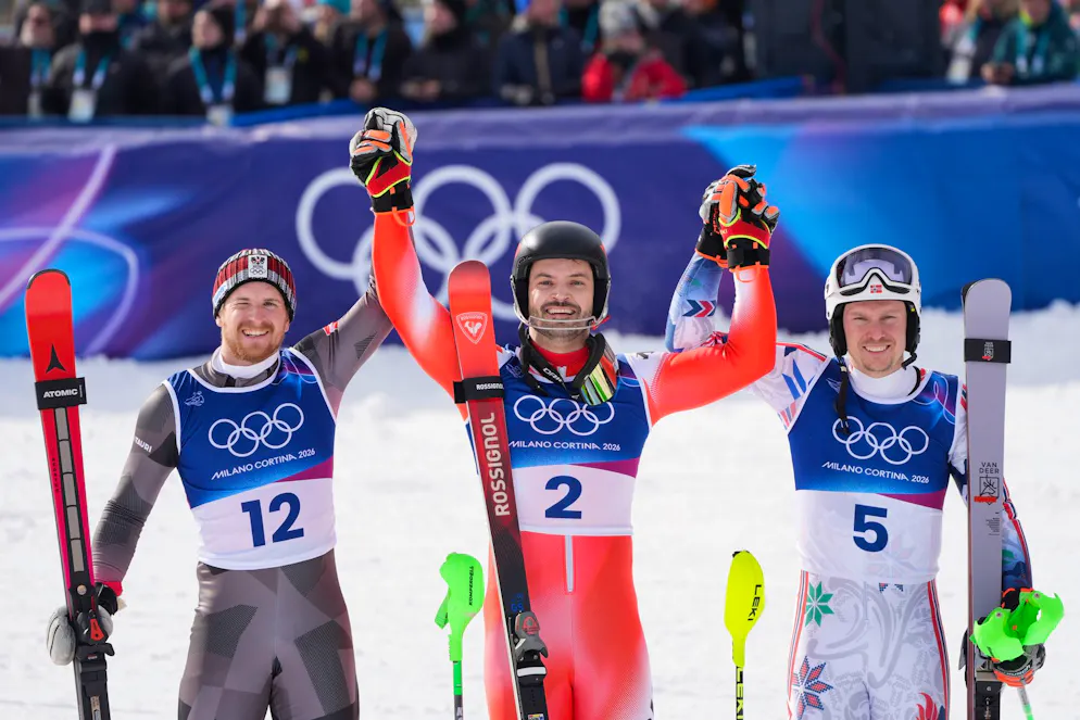 Seconda settimana delle Olimpiadi di Milano-Cortina. Loic Meillard, vincitore della medaglia d'oro, con Fabio Gstrein (argento, a sinistra) e Henrik Kristoffersen (bronzo, a destra).