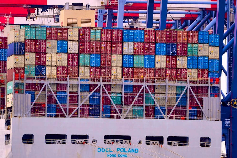 The US trade deficit fell only slightly last year despite tariffs.