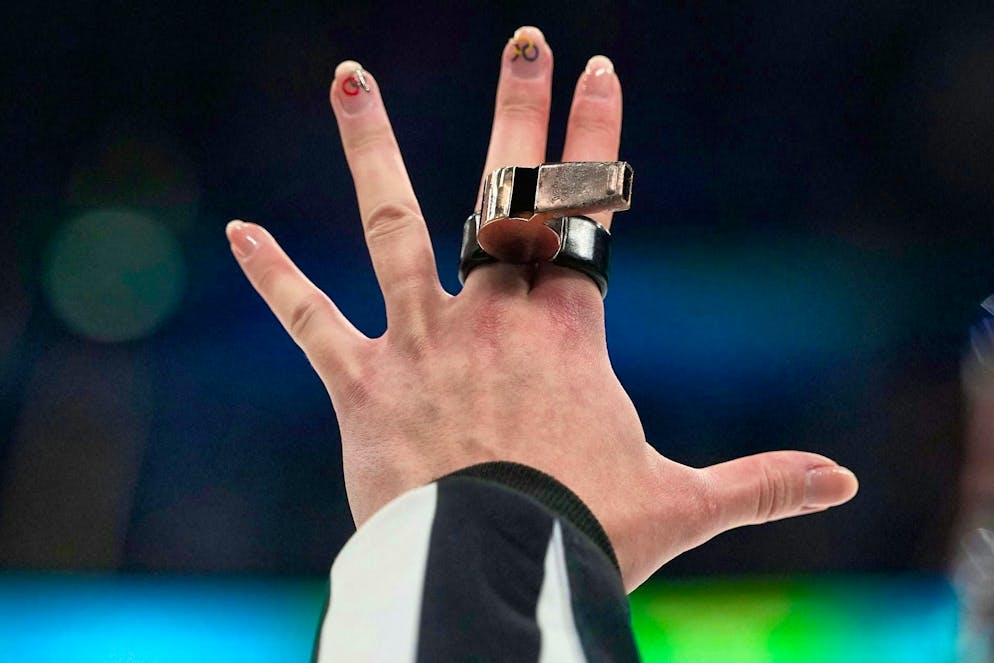 The best pictures of the 2026 Olympic Games in Milano Cortina. The referee had everything under control in this game.