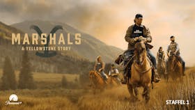 A group of U.S. Marshals wearing tactical vests ride horses through a dusty, golden field against a backdrop of hazy mountains and evergreen trees in a promotional poster for 