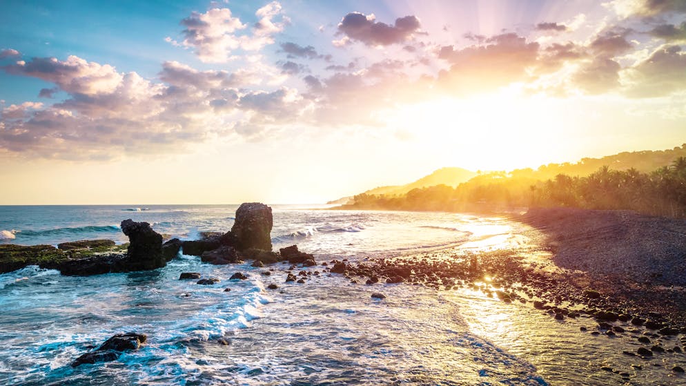 El Tunco Rock rocky coastline sunset in surf city El Slavador