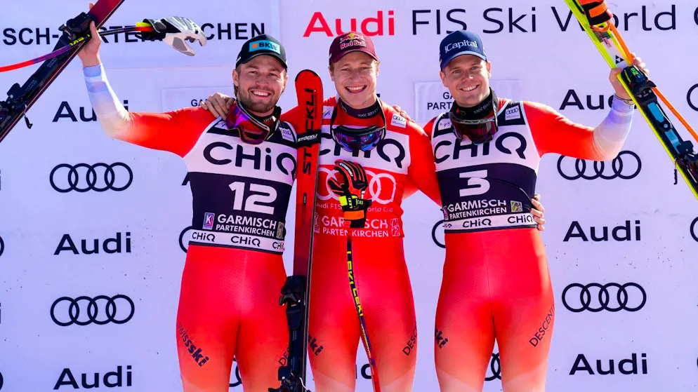 Alexis Monney, Marco Odermatt and Stefan Rogentin celebrate a Swiss triple victory.