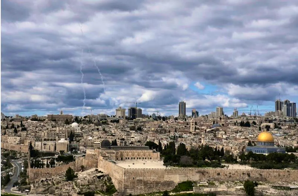 USA and Israel attack Iran. The traces of an intercepted air defense missile can be seen over the Old City of Jerusalem.