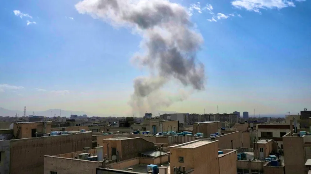 dpatopbilder - Smoke rises after an explosion in Tehran. Photo: Vahid Salemi/AP/dpa