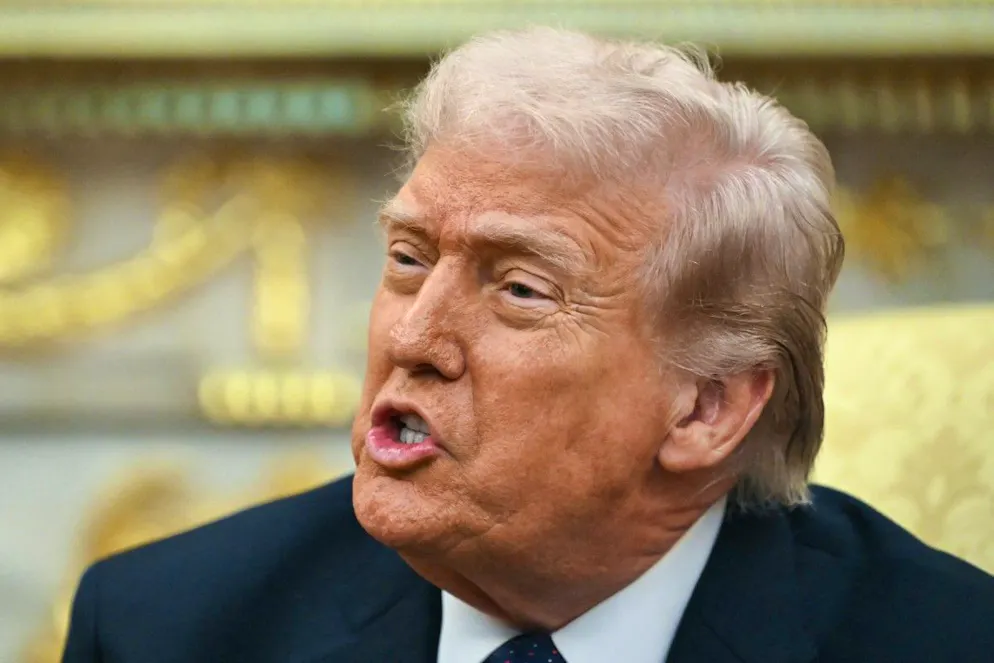 US President Donald Trump speaks during a meeting with German Chancellor Friedrich Merz in the Oval Office of the White House in Washington, DC on March 3, 2026. Chancellor Merz is the first European leader to visit President Trump since the United States and Israel launched their war against Iran. (Photo by ANDREW CABALLERO-REYNOLDS / AFP)