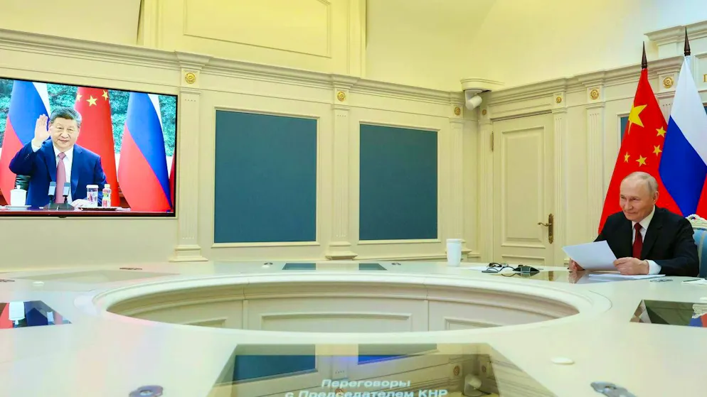 Vladimir Poutine (à droite) lors d'une rencontre virtuelle avec Xi Jinping le 4 février.