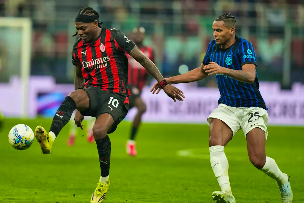 Manuel Akanji (right) and Inter were beaten by AC Milan with Rafael Leao.