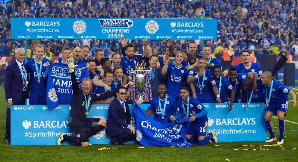 Gökhan Inler (far right) and Leicester accept the championship trophy.