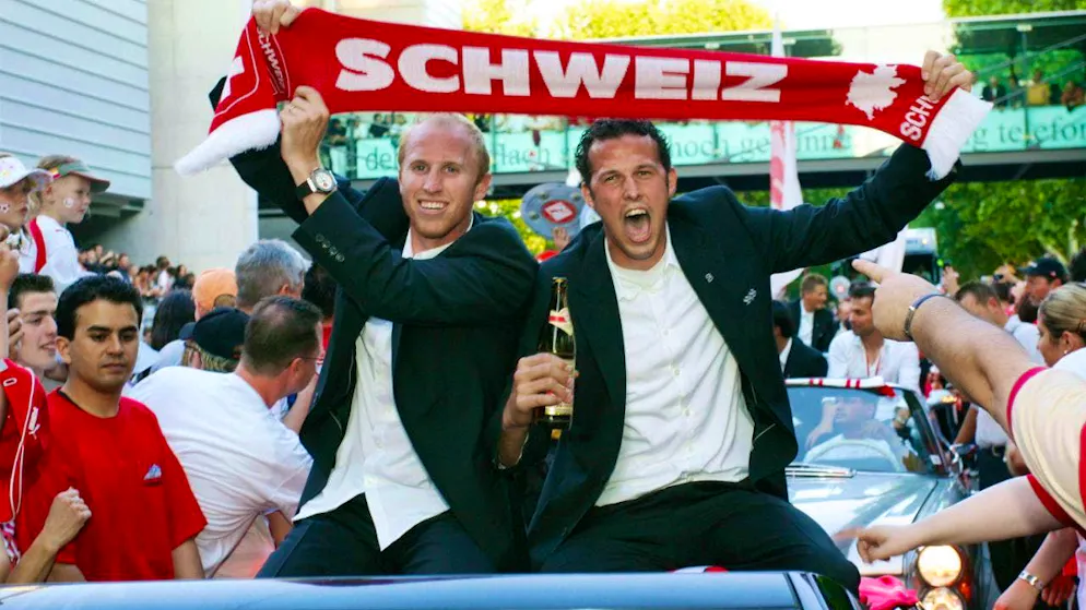 Ludovic Magnin (left) and Marco Streller celebrate with Stuttgart after the title triumph.
