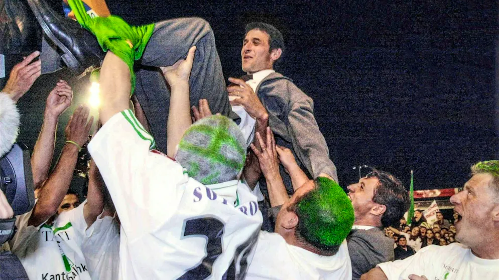 Long live the champion coach: Marcel Koller is celebrated by his players after winning the championship.