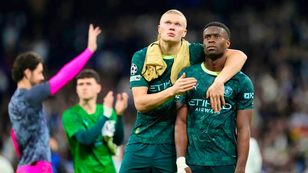 Erling Haaland and Marc Guehi after Manchester City's 3-0 defeat in Madrid
