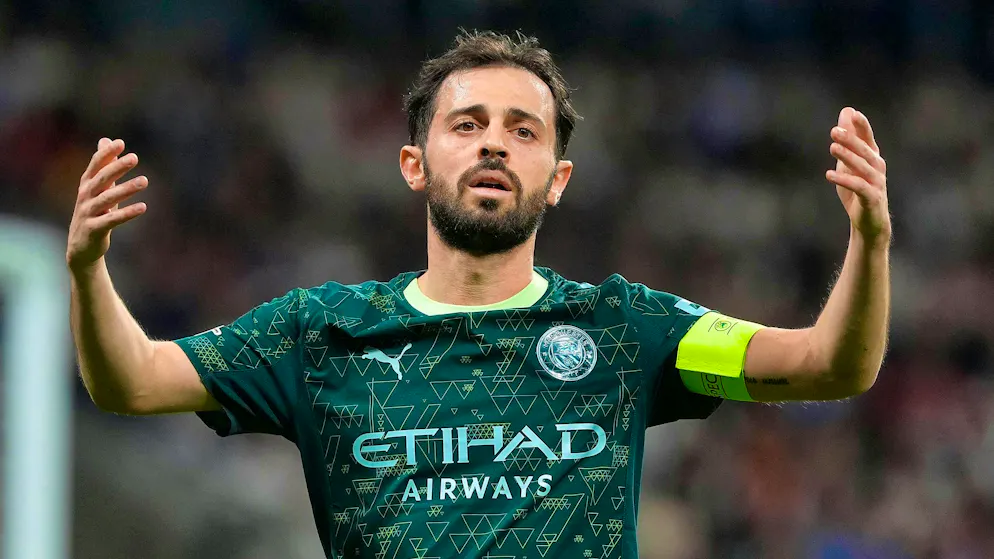 City captain Bernardo Silva throws up his hands.