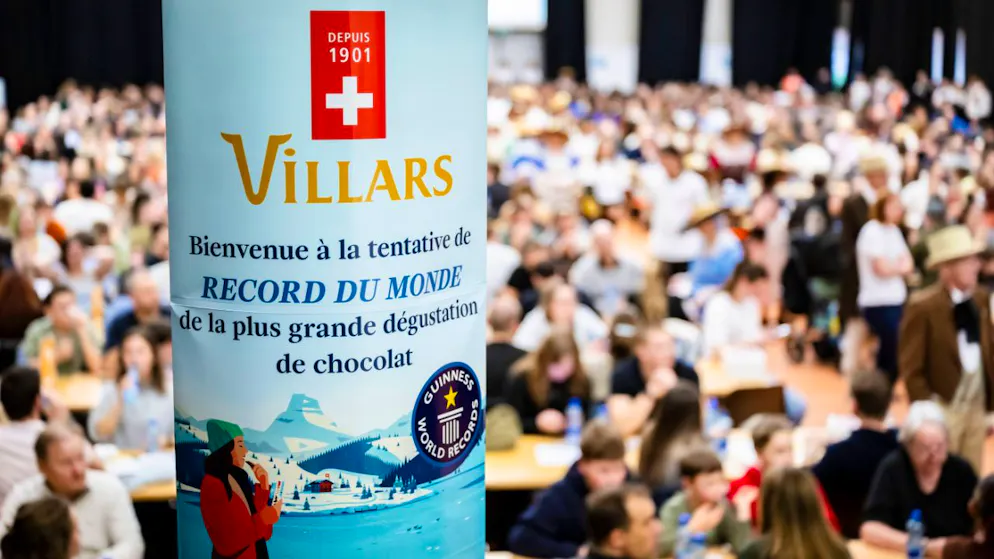 Record du monde de la dégustation de chocolat à Fribourg - Gallery. Un millier d'amateurs de chocolat se sont régalés dimanche à Fribourg.