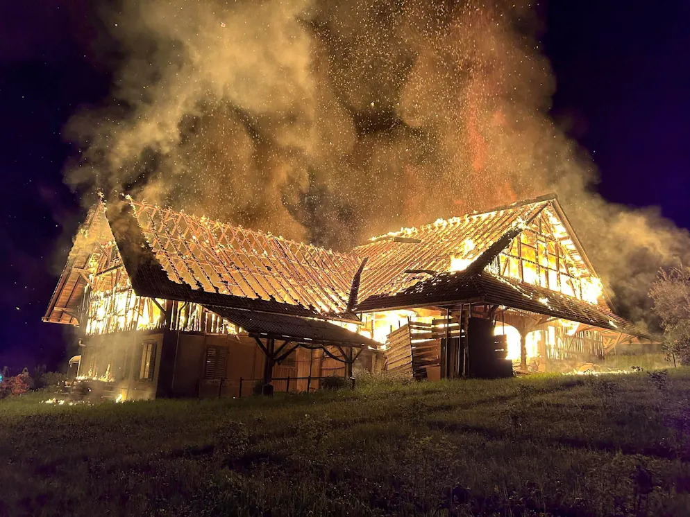 The men allegedly set fire to this vacant residential building, among others, in May 2024 