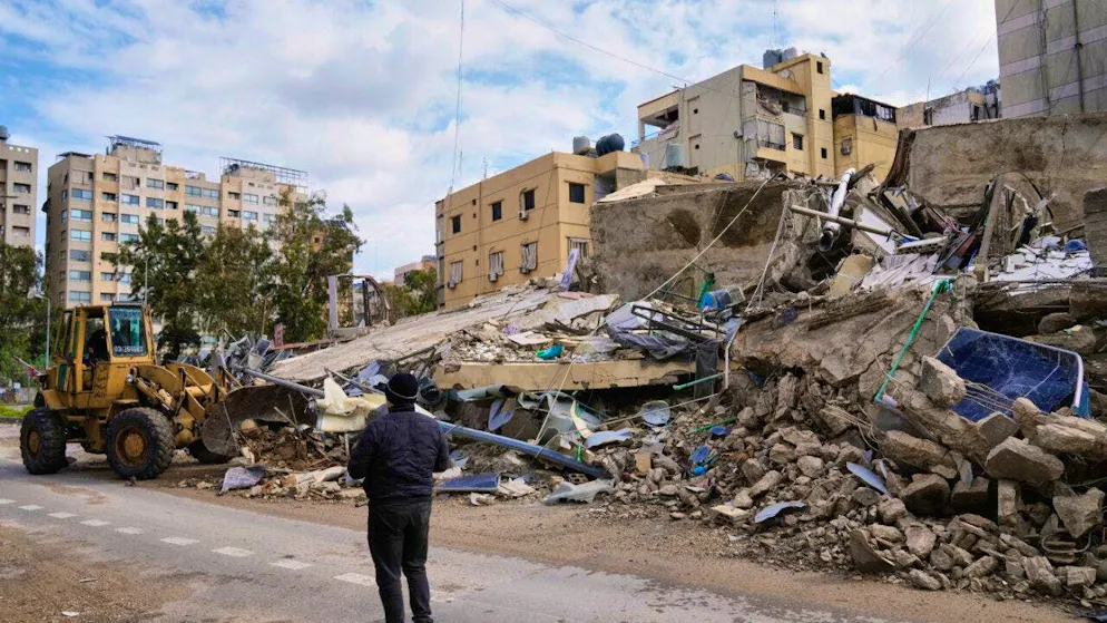 A wheel loader clears rubble from buildings destroyed in an Israeli airstrike in Dahija, a southern suburb of Beirut. Photo: Bilal Hussein/AP/dpa