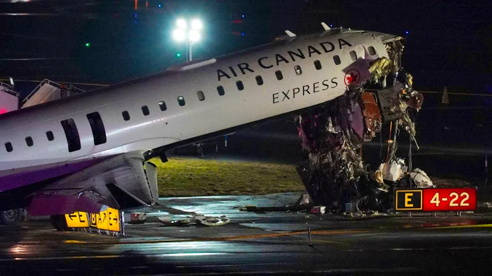 Two people died in the collision on the runway at LaGuardia Airport.