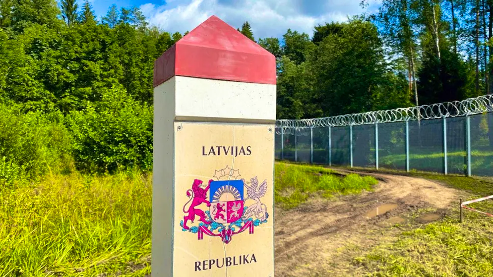 ARCHIVE - A border pillar with the inscription "Republic of Latvia" stands on the Latvian border with Russia during the visit of Latvian President Rinkevics. Photo: Alexander Welscher/dpa