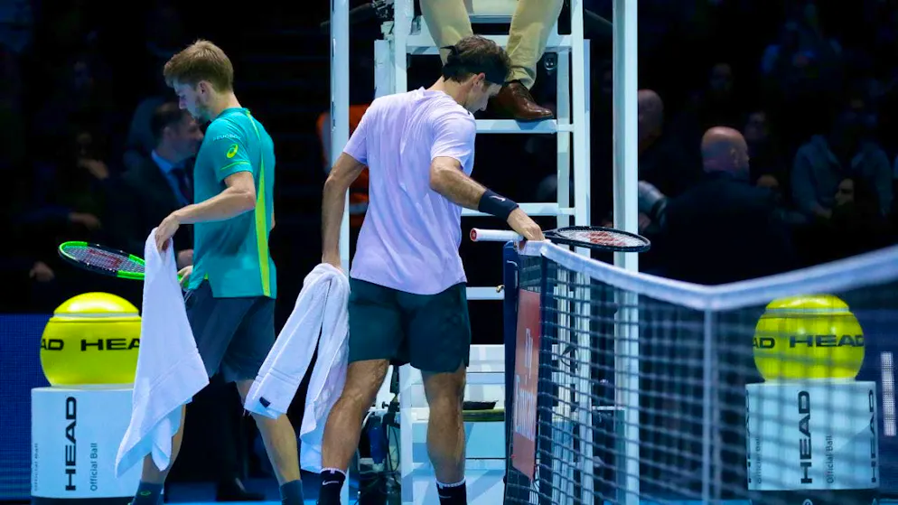 Goffin's biggest victory - he defeated Roger Federer (right) in the semi-finals of the Masters Cup in London