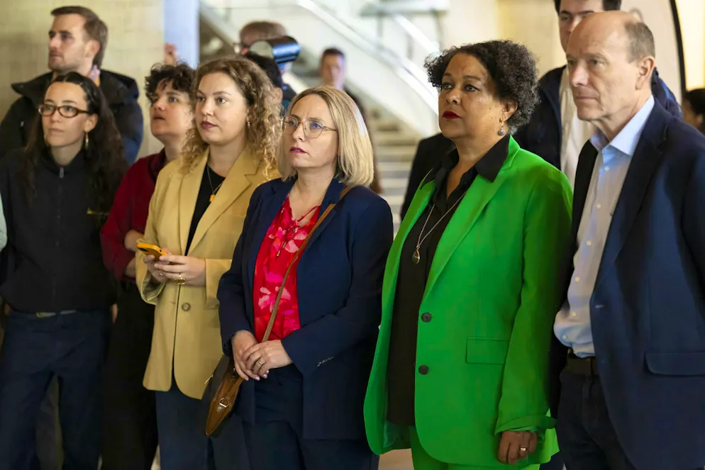 Manuela Kocher Hirt, Party President of the SP Canton of Bern, center, Brigitte Hilty Haller, Co-Party President of the Greens, Canton of Bern, 2nd right, and Michael Aebersold, SP, right, watch the first projections of the results of the Government Council of the Canton of Bern.