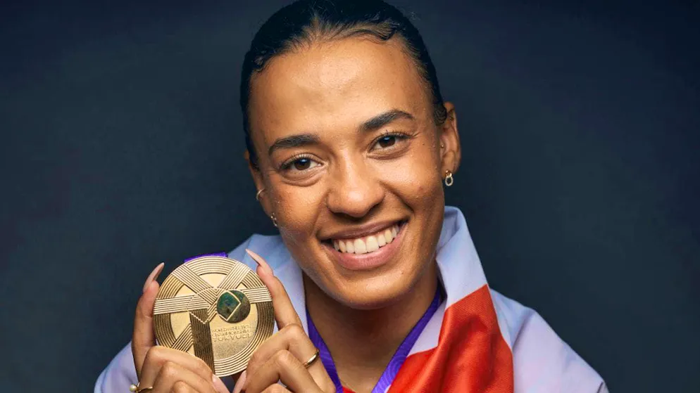 Between hurdle and needle: a dress runs with you - Gallery. Ditaji Kambundji with World Championship gold