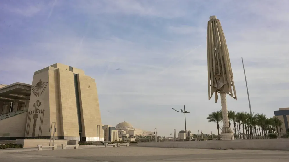 Government district. Gigantic and futuristic: the oversized parasol in the government district looks like a landmark. Such constructions are intended to provide shade and make the extreme desert climate more bearable - high-tech to combat the heat.