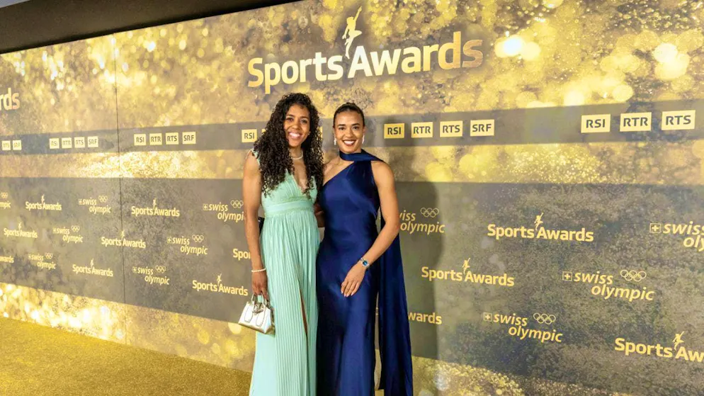 Between hurdle and needle: a dress runs with you - Gallery. Mujinga and Ditaji Kambundji pose at the Sports Awards