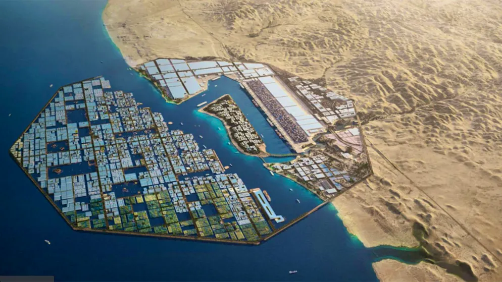 Una vista a volo d'uccello di Oxagon: il rendering mostra il porto e la città industriale previsti sul Mar Rosso. Il porto è già in parte operativo e l'espansione continua.