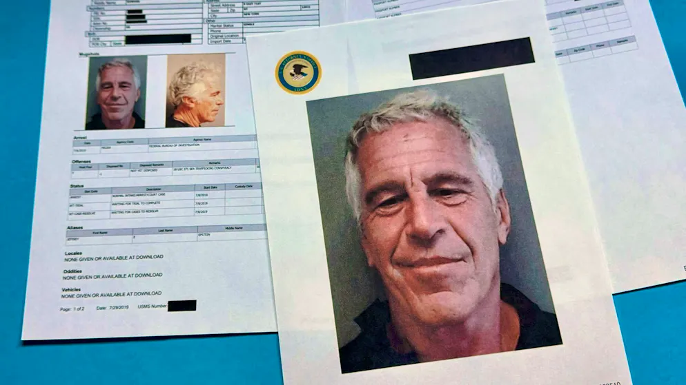Why now? Melania Trump's puzzling Epstein appearance - Gallery. Documents with redacted passages on the Epstein case lie on a table. (archive image)
