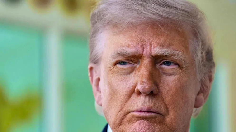 US President Donald Trump speaks in front of the Oval Office of the White House. Photo: Alex Brandon/AP/dpa