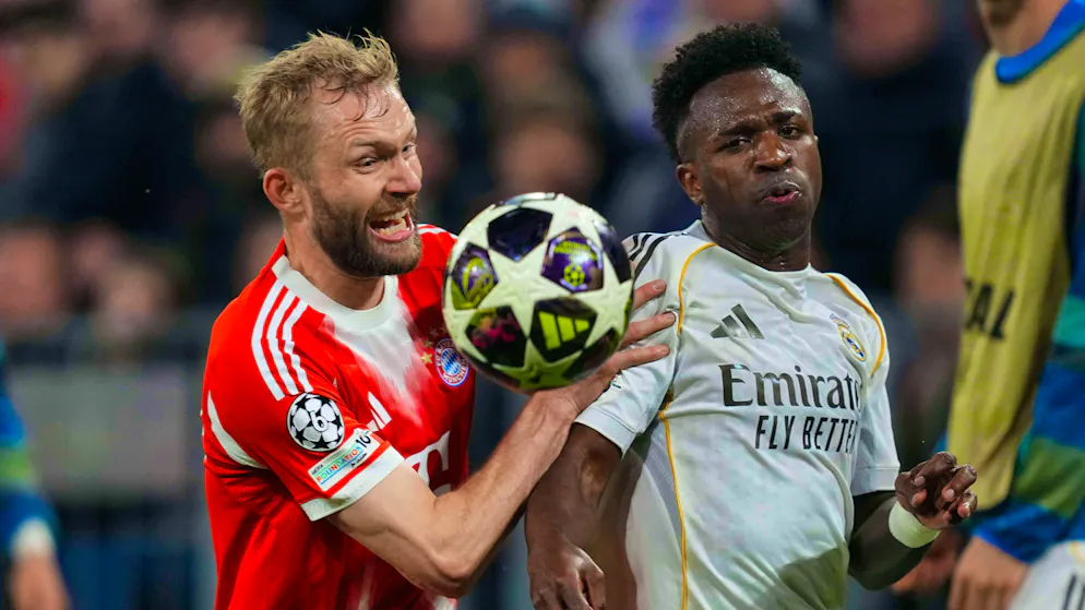 Konrad Laimer in a duel with Vinicius Junior.