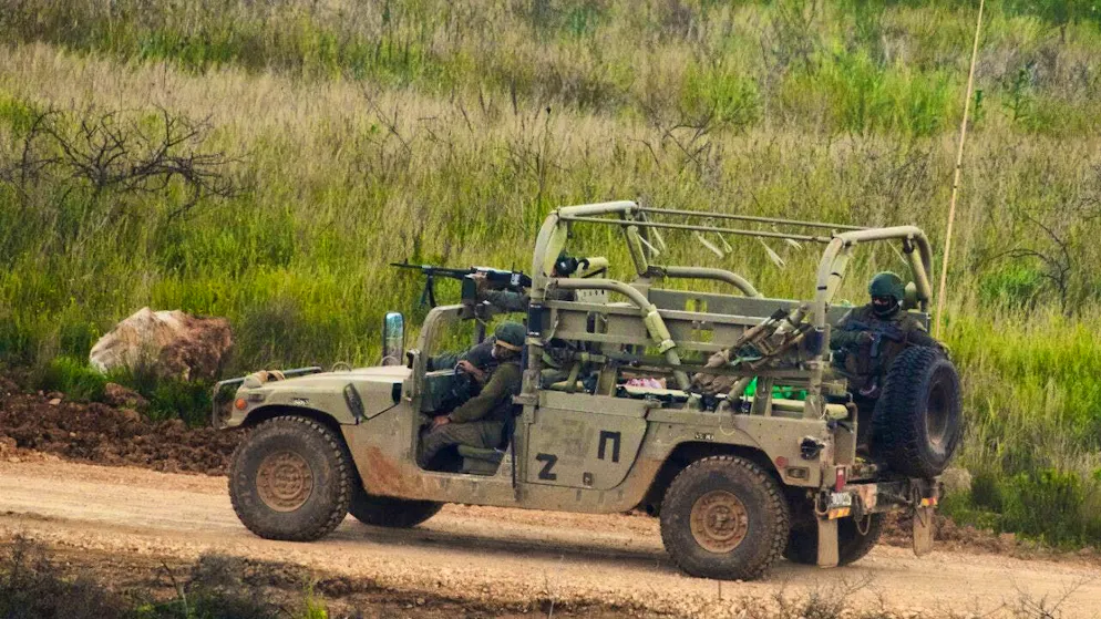 ARCHIVE - Israeli soldiers drive in southern Lebanon, seen from northern Israel. Photo: Ariel Schalit/AP/dpa (archive photo)