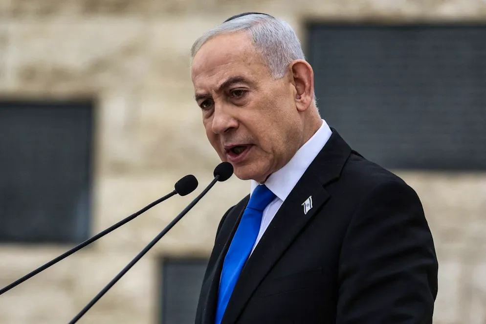 Israels Prime Minister Benjamin Netanyahu speaks during a ceremony commemorating Israels Remembrance Day for fallen soldiers, or Yom HaZikaron, at the Military Cemetery on Mount Herzl in Jerusalem on April 21, 2026. (Photo by Ilia YEFIMOVICH / POOL / AFP)