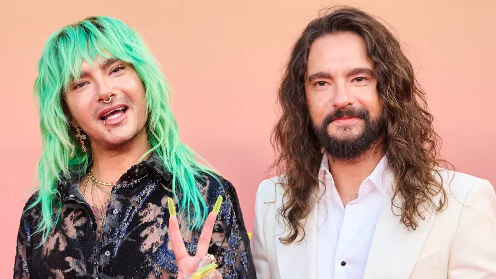 Bill und Tom Kaulitz würden schon seit Jahren gerne einmal mit Ex-Kanzlerin Angela Merkel Kartoffelsuppe essen gehen.