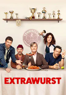 Komödie Extrawurst mit Gruppe am Tisch und Pokalen im Hintergrund, satirischer Blick auf Vereinsleben