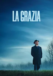 Film drammatico La Grazia con uomo solo in un paesaggio nebbioso, atmosfera contemplativa e silenziosa