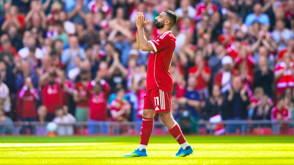The thigh pinches: Mohamed Salah applauds the fans during his substitution on Saturday