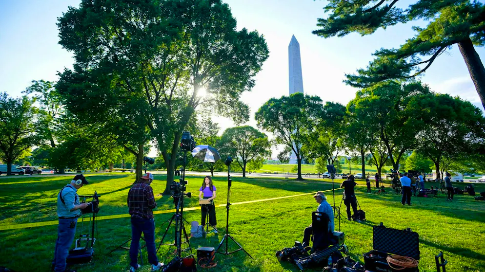 Journalists and police officers after a shooting incident near the White House and the Washington Monument. (May 4, 2026)