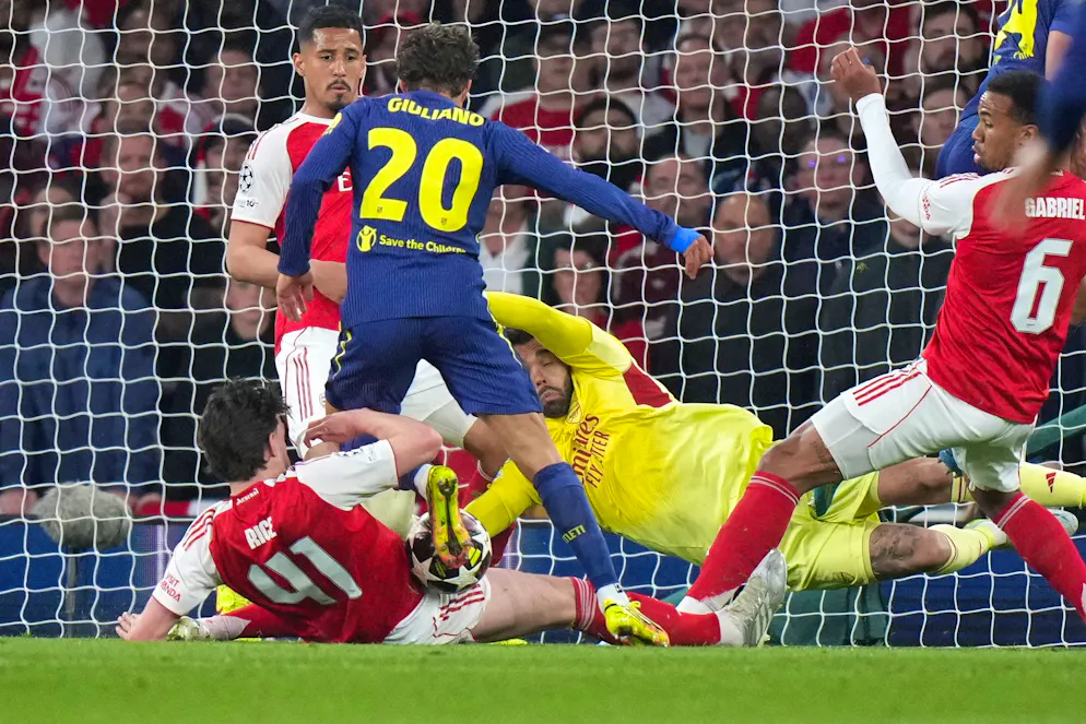 Arsenal's Declan Rice, left, blocks a shot at goal from Atletico Madrid's Giuliano Simeone during a Champions League semifinal, second leg, soccer match between Arsenal FC and Atletico Madrid in London, Tuesday, May 5, 2026. (AP Photo/Alastair Grant)