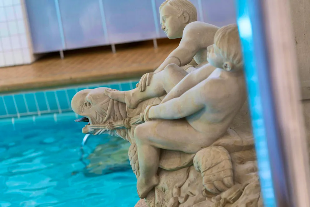 The Volksbad St. Gallen is decorated with various figures.