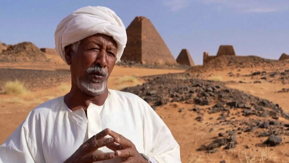 War-torn Sudan. The last temple guardian fears for his pyramids
